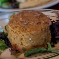 Mofongo · Mashed green plantains with smoked ham and veggie sofrito. Add Meat 4