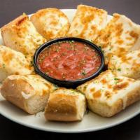 Sicilian Garlic Cheese Bread · A generous portion of fresh bread topped with a tasty blend of garlic and three melted chees...