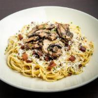 Garlic Mizithra · Spaghetti with Mizithra Cheese & Browned Butter tossed with a delicious blend of sautéed gar...