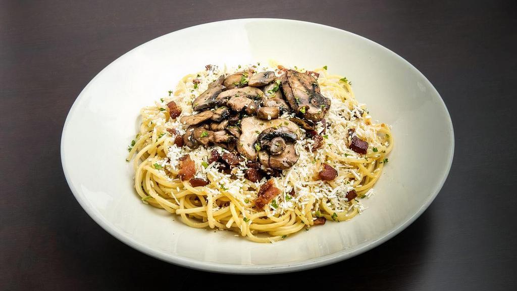 Garlic Mizithra · Spaghetti with Mizithra Cheese & Browned Butter tossed with a delicious blend of sautéed garlic, bacon, and mushrooms.