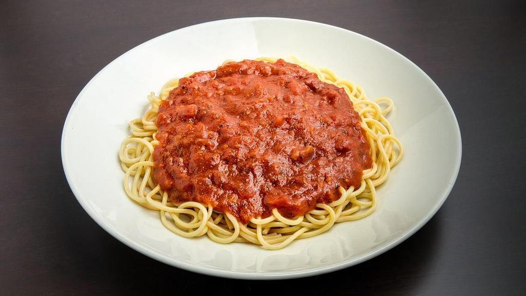 Marinara Sauce · Our famous from scratch recipe of fresh onions, carrots, tomatoes, and garlic sauteed in olive oil and Italian seasonings. Served over spaghetti cooked to perfection.