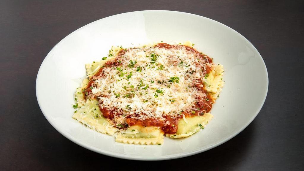 Spinach & Cheese Ravioli · Ravioli stuffed with spinach and two delicious cheeses, and topped with our savory Marinara Sauce.