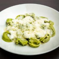 Spinach Tortellini With Alfredo Sauce · Hat shaped pasta, stuffed with a blend of roasted chicken and Mortadella meats, and Romano c...