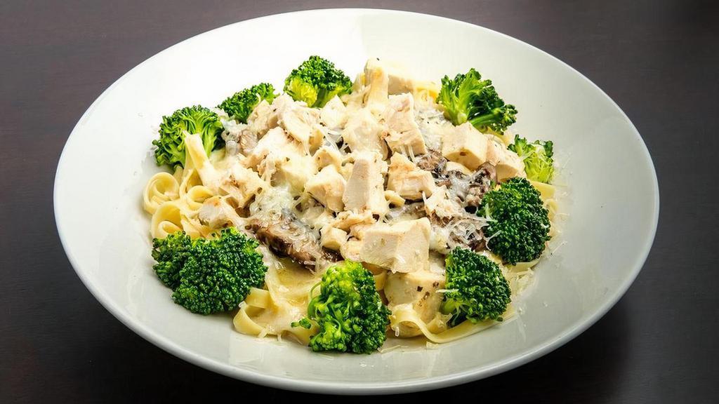 Breast Of Chicken Fettuccine · Fettuccine topped with tender diced chicken breast, fresh broccoli, sautéed mushrooms, Alfredo Sauce, and shredded Romano cheese.