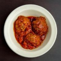 Three Meatballs · Three generously portioned handmade beef meatballs, delicately seasoned with a blend of herb...