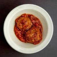 Two Meatballs · Two generously portioned handmade beef meatballs, delicately seasoned with a blend of herbs ...