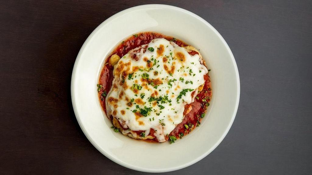 Breast Of Chicken Parmigiana · A perfectly seasoned breast of tender chicken with melted cheese and Pomodoro Sauce.