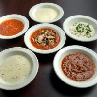 Side Sauce · Each side includes a 5oz serving of our made from scratch sauces. Add to any entree, or enjo...