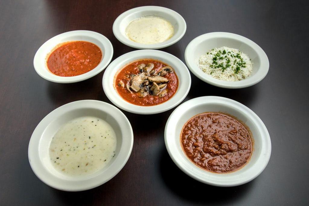 Side Sauce · Each side includes a 5oz serving of our made from scratch sauces. Add to any entree, or enjoy as a dipping sauce for our bread or appetizers!
