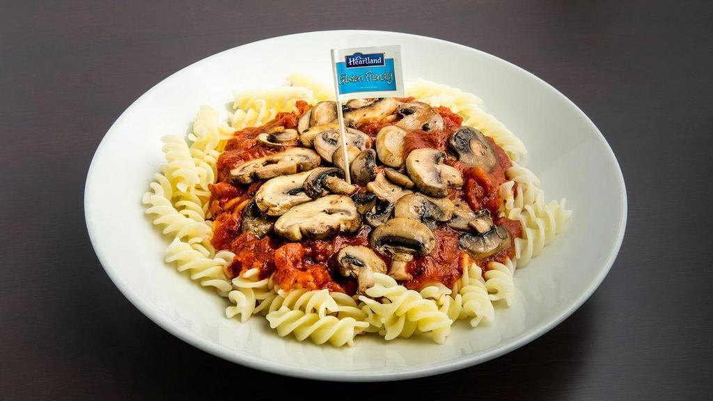 Mushroom Sauce · Our from scratch Marinara Sauce topped with freshly sauteed seasoned mushrooms. Served over gluten friendly fusilli pasta cooked to perfection