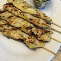 Chicken Satay · 4 marinated chicken breast skewers. Served with peanut and cucumber sauce.