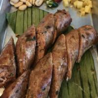 THAI SAUSAGE (Sai Oua) · Homemade spicy northeastern Thai sausages full of herds and spices.