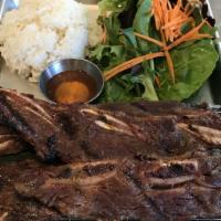 Beef Short Ribs Set · Grilled marinated beef short ribs served with jasmine rice and veggies. Chose a sauce. One o...
