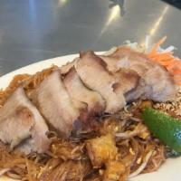Pad Thai Pork Jowl · Thinly slice pork jowl (fatty) over pad thai noodles.
