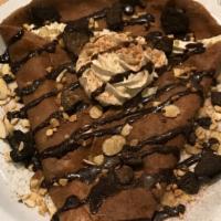 Chocolate Crepe · Soft chocolate crepe with oreo crumbs, nut topping, almonds, whipped cream and chocolate sau...