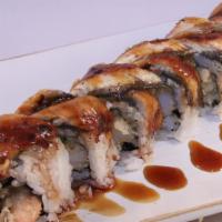 Black Dragon Roll · Crunch spicy tuna, spicy yellowtail inside, whole piece eel on top.