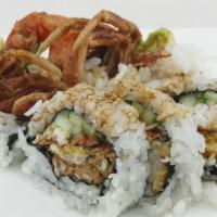 Spiderman Roll · Softshell crab tempura, cucumber, cream cheese topped with spicy yellowtail, avocado with ma...