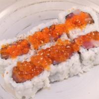Ginza Roll · Tuna, albacore, salmon w/ tobiko & ikura.

Consuming raw or undercooked meats, poultry, seaf...