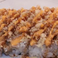 Go Go Roll · Spicy level 1. Shrimp tempura, crab meat, cream cheese, avocado + tempura crunch.