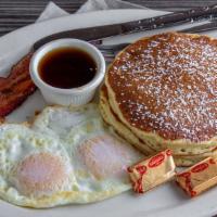 2X2X2 · Two pancakes, two eggs any style, and your choice of bacon or chicken apple sausage.