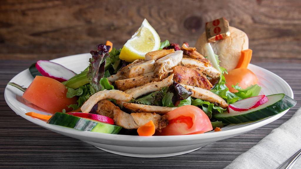 Cobb Salad · Organic mixed greens, roma tomatoes, cucumbers, carrots, red onions, bacon, chicken and avocado. Tossed with house vinaigrette dressing.