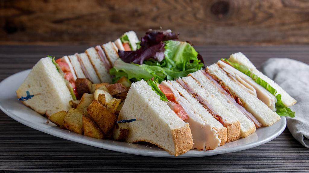 The Clubhouse · Smoked turkey, ham, bacon, lettuce, tomatoes, and mayo. Serve on wheat, rye, or sourdough.