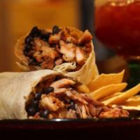 Petite Burrito · A smaller version of our famous regular burrito. Meat, beans, rice and salsa. Any extras are...