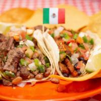 Regular Taco · Meat, beans, rice and salsa. If not specified, we will prepare for you an award winning Gril...