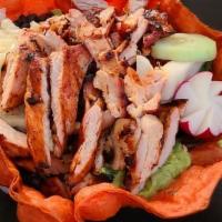 Grilled Chicken Taco Salad:. · Our Grilled Chicken salads are served with lettuce, spring mix, tomatoes, jicama, cucumbers,...