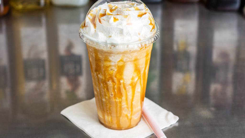 Blended Butterfinger White Mocha · Premium White Chocolate, Hazelnut, and Peanut Butter blended to perfection and swirled with decadent caramel syrup!