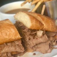 French Dip · Thinly sliced prime rib with a side of creamy horseradish, au jus on a sourdough roll.