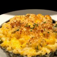 Truffle Mac-N-Cheese · Cheddar, asiago, truffle oil, topped with bread crumbs.
