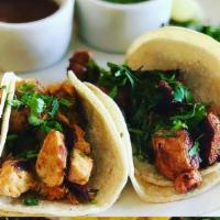 Chicken Street Tacos · 4 Small tacos served with cilantro and onion, side of salsa and chips.