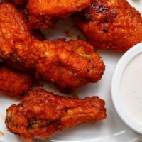 Medium 8pc Wing Combo · 8 boneless or bone-in wings with up to 2 flavors, regular fries or veggie sticks, 1 dip and ...