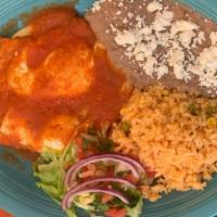 Huevos Rancheros · Two Fried Eggs over soft-fired corn tortillas, topped with Red salsa, served with Rice and  ...