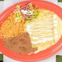 Enchiladas Suizas · Two chicken enchiladas topped with a cream-cheese green sauce, served with a side of rice an...