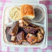 Syd's St.Louis Style Rib Tips · Served with baked beans, potato salad, and roll.