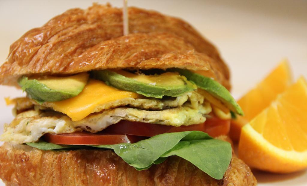 Florentine Croissant · Scrambled Egg with mushrooms, Spinach, Tomatoes, Cheese & Avocado.