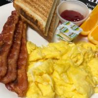 L'American · Scramble Eggs, Cheese (Cheddar Cheese) and Choice of Meats. Bacon/ Ham/ Sausage/ Turkey. (On...