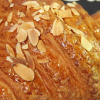 Almond Croissant · Topping with Almond And Filled With Almond Paste