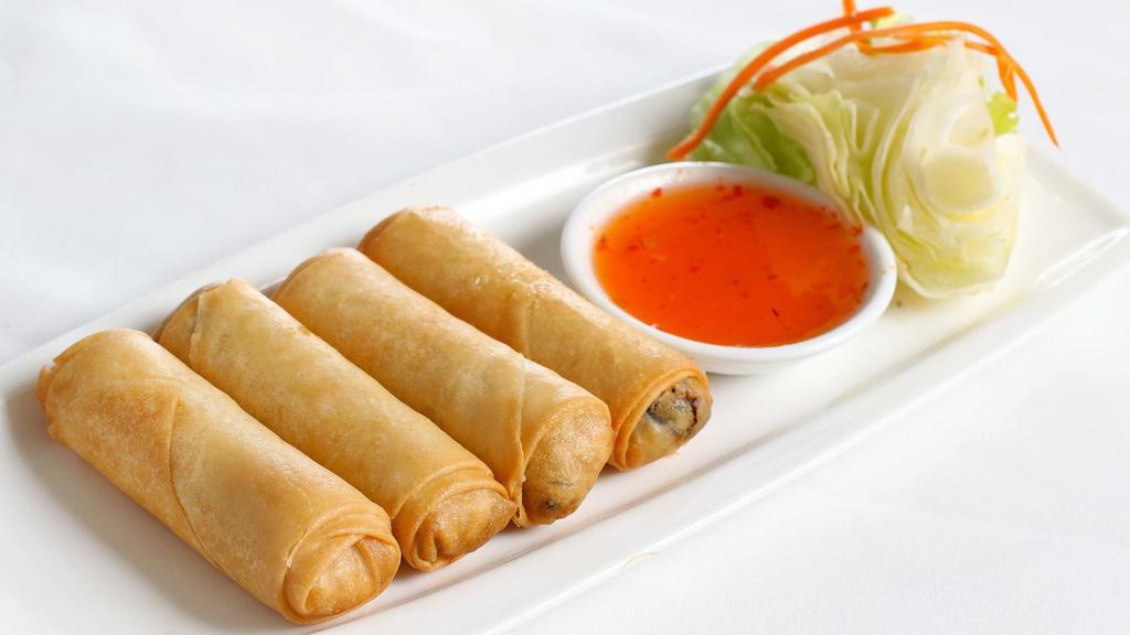 Vegetarian Egg Rolls · Four pieces. Vegetarian egg rolls stuffed with silver noodles, black mushrooms faro, cabbage, carrot, served with homemade sweet and sour sauce.