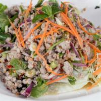 Larb Salad · Choice of chicken, pork, or beef. Minced with onions, mint leaves, cilantro, roasted rice po...
