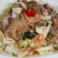 Silver Noodle Salad · Steamed silver noodle cooked with prawns and minced pork, mushroom, onion, and cilantro with...