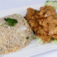 Fried Rice with Fried Chicken · Steamed jasmine rice stir fried with egg, tomatoes, green onion, Thai seasoning sauce with c...