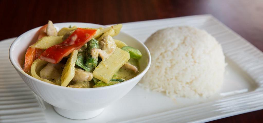 36. Green Curry Over Rice · Spicy curry cooked with coconut milk, sweet basil, bamboo shoots, and eggplant.
