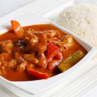 33. Pa Naeng Curry Over Rice · Medium spicy curry with peanut sauce, coconut milk, and bell pepper.