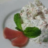 Khiyar Bil Zabadi · Diced cucumber in yogurt, fresh garlic, mint.