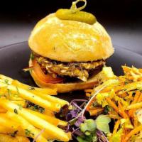 Bella Burger (Vegan) · Portobello Mushroom Cap stuffed with sautéed mushrooms, onions, herbs, and vegan cheese. Ser...