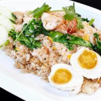 Shrimp Paste Fried Rice · Spicy Fried Rice with Shrimps, Calamari, Shrimp Paste; serve with raw Thai Eggplant and Salt...