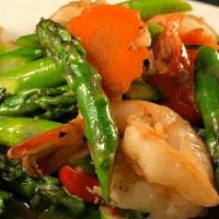 Prawns Asparagus · Prawns stir-fried with fresh Asparagus, Red Bell Peppers, Basil Leaves in Chili and Garlic S...